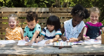 Children smile on a school field trip